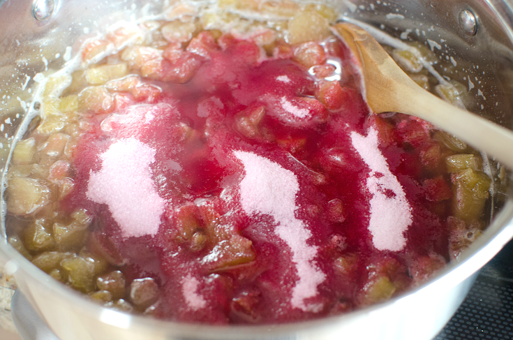 Easy Strawberry Rhubarb Jam - Jello crystals being adding into the sauce pan