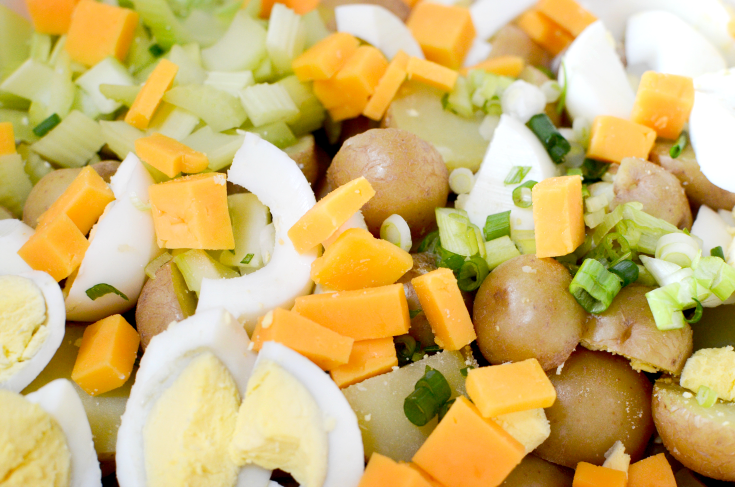 Fully Loaded Potato Salad - mix in cheese hard boiled eggs, celery and onions