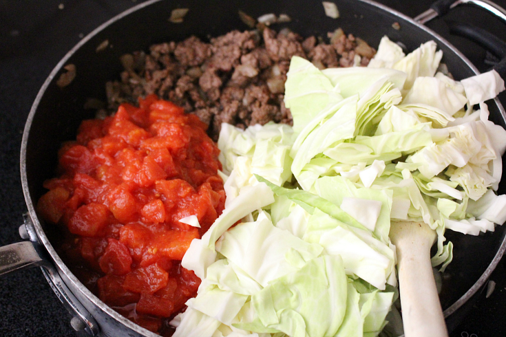 One Pot Unstuffed Cabbage Rolls - Add cabbage and diced tomatoes in to pan