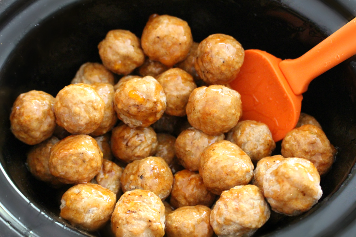 Honey Buffalo Crockpot Meatballs - Stir your slow cooker meatballs