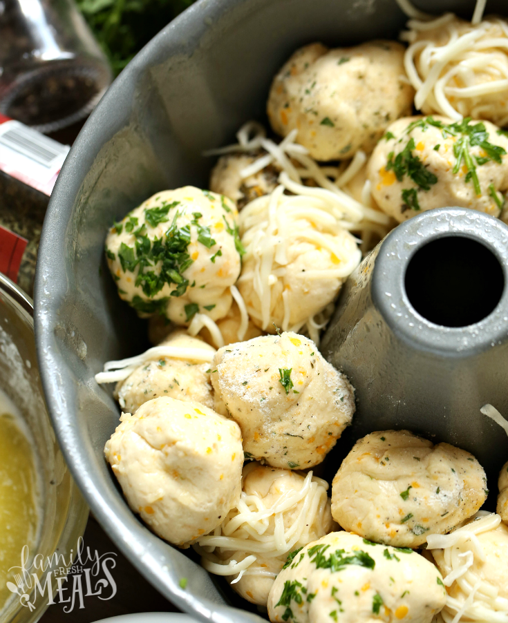 Easy Cheesy Pull Apart Bread Recipe - Easy Bread recipe - Cheese and herbs on bread balls