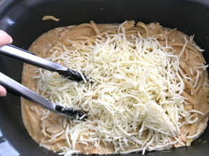 shredded cheese added to slow cooker