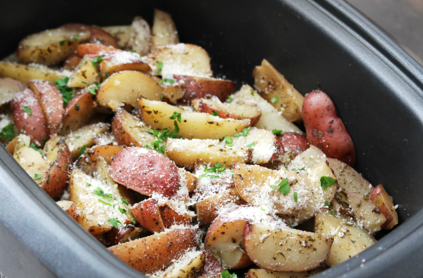 Crockpot Parmesan Potato Wedges - Cooked potatoes in slow cooker