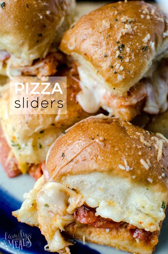 Pizza sliders stacked on a plate