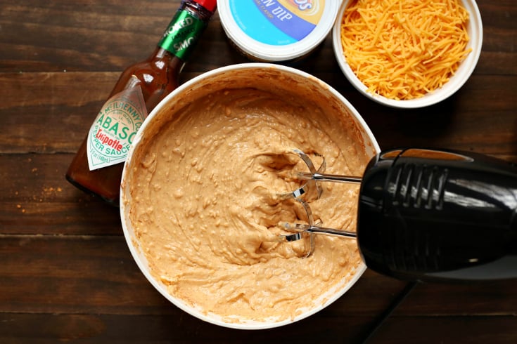 Cheesy Bean Dip - Dip being mixed with a hand mixer - Family Fresh Meals