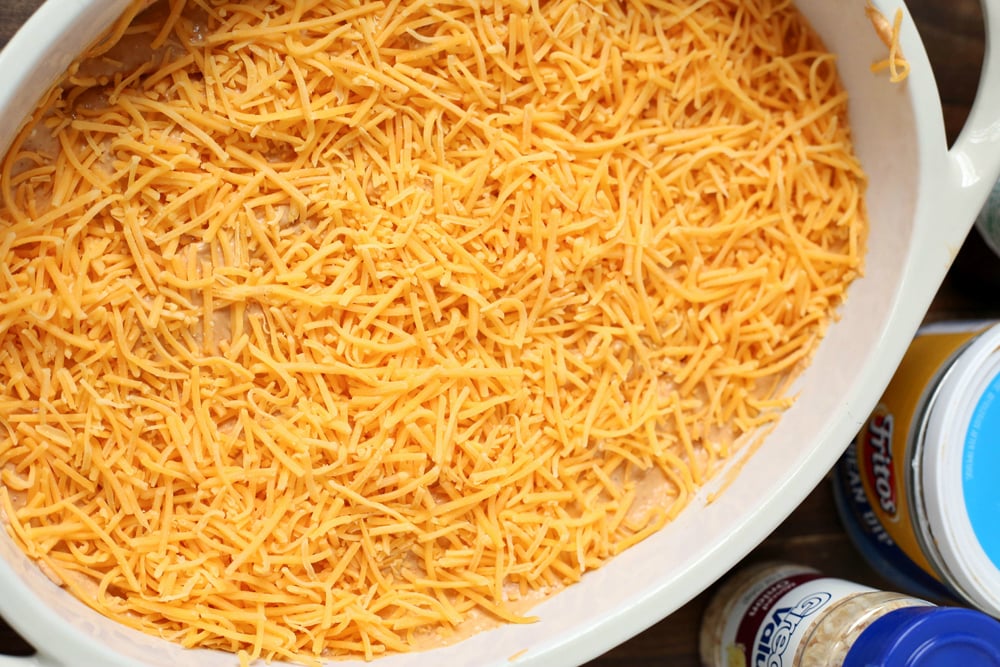 Cheesy Bean Dip - Dip in a baking dish, topped with shredded cheese