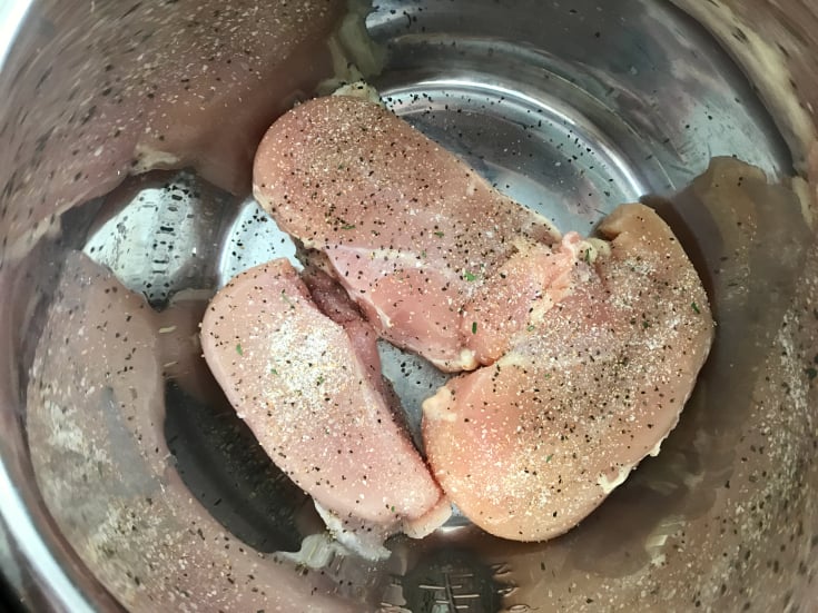 Instant Pot Shredded Chicken Breast - Seasoned chicken breast in pressure cooker