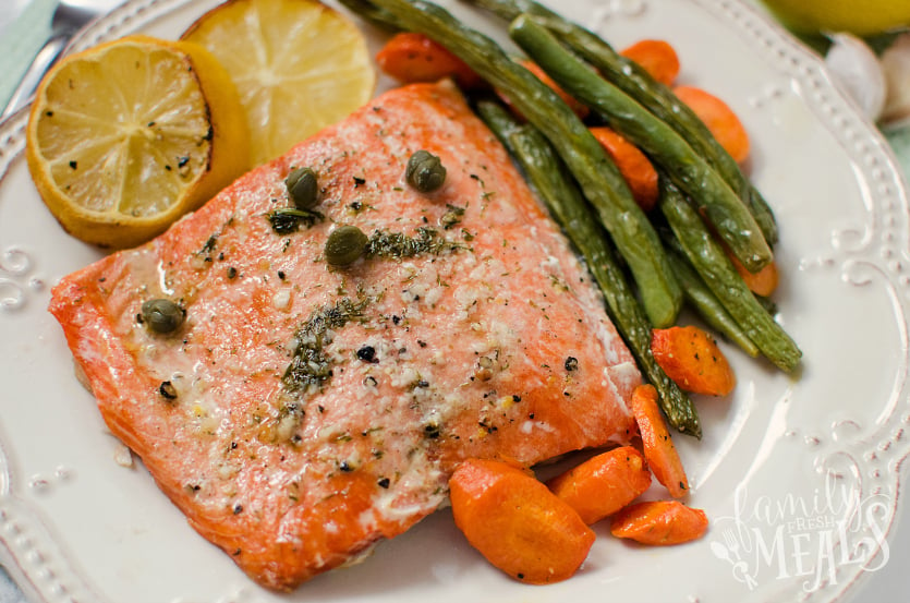 Salmon Sheet Pan Dinner - Easy baked salmon recipe served with lemons vegetables