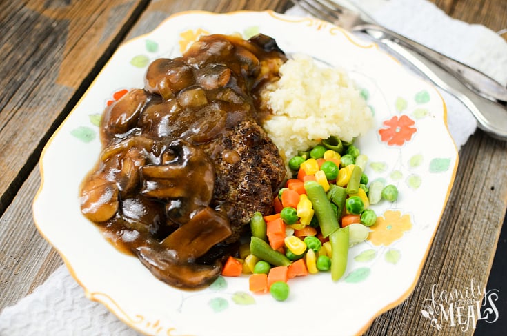 Crockpot Salisbury Steak Recipe served on a plate with veggies