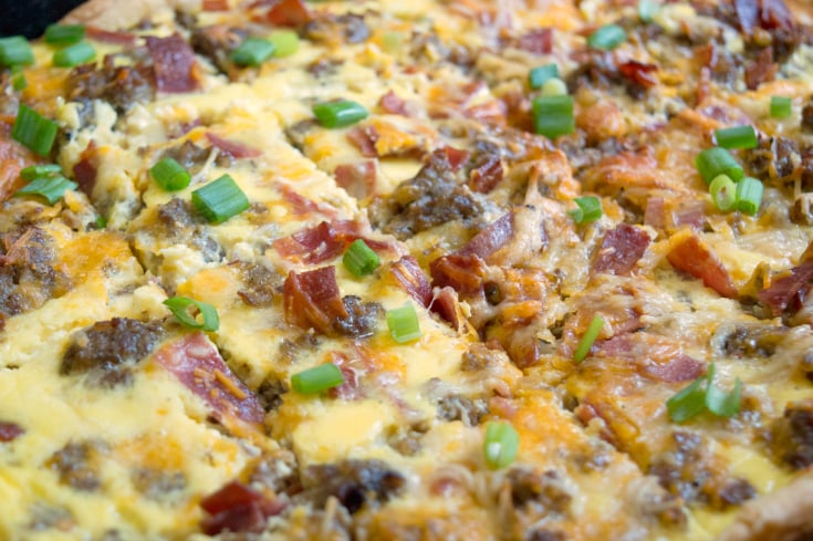 Meat Lovers Breakfast Bake Slab - cooked breakfast slab topped with green onions