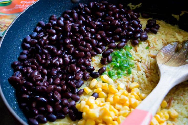One Pot Cheesy Chicken Monterey - stir in black beans, corn and onions
