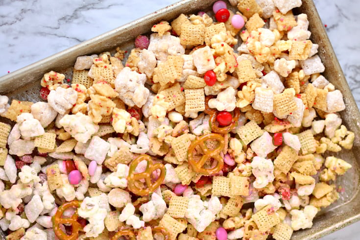 Valentine's Snack Mix with Free Printables - snack mix drying on a baking sheet