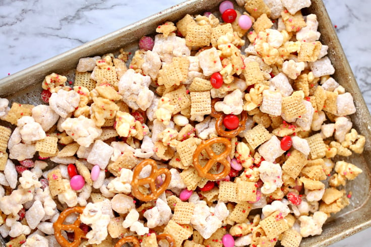 Valentine's Snack Mix with Free Printables - snack mix drying on a baking sheet