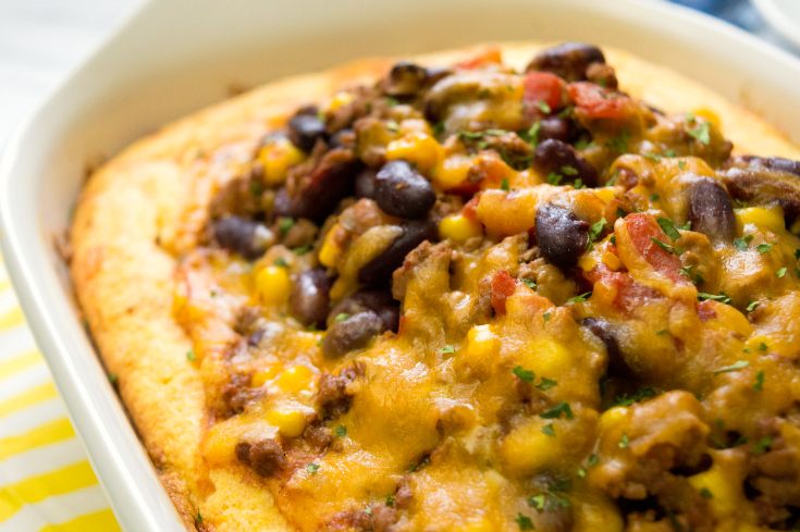 Chili Stuffed Cornbread Casserole - Casserole baked and topped with cheese