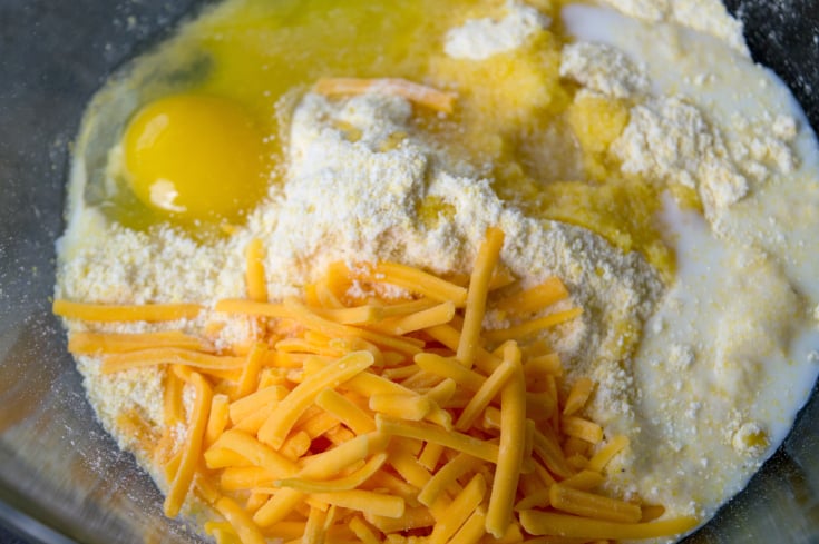 Chili Stuffed Cornbread Casserole - Cornbread ingredients in a bowl