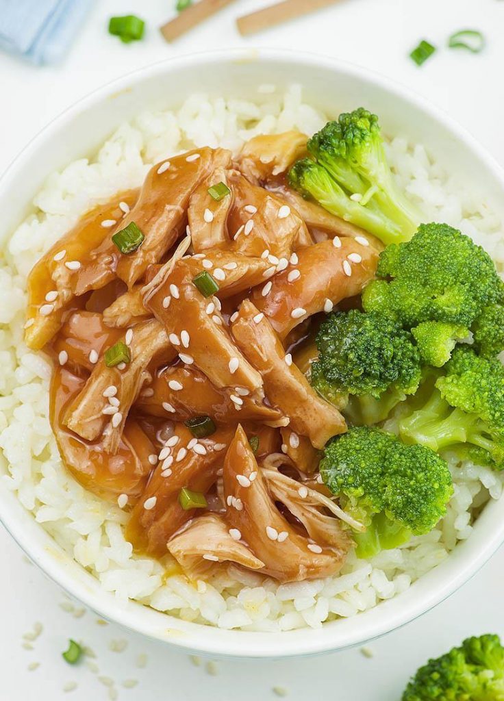 Set it Forget it Easy Crockpot Recipes - Chicken Teriyaki served on a white plate