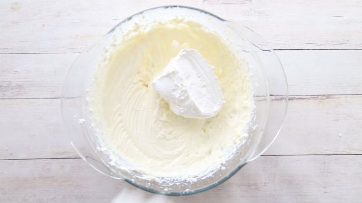 OMG Chocolate Lasagna Dessert - Add whipped cream to the bowl