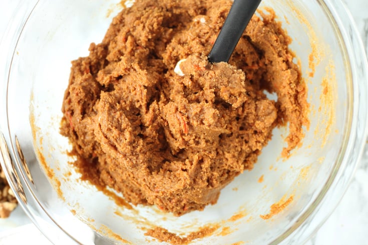 Carrot Cake Cookie Cups - carrot cake batter mixed in a glass bowl