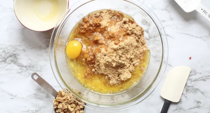 Carrot Cake Cookie Cups - carrot cake mix, egg and oil in a glass bowl