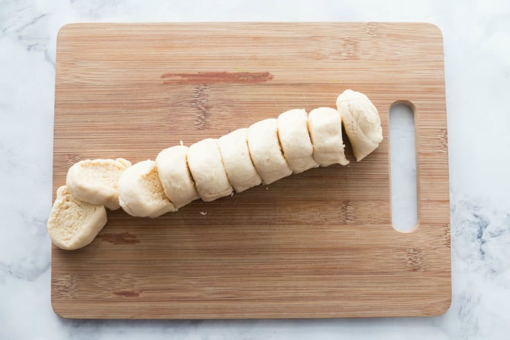 Cherry Cream Cheese Danish - Sliced dough on cutting board