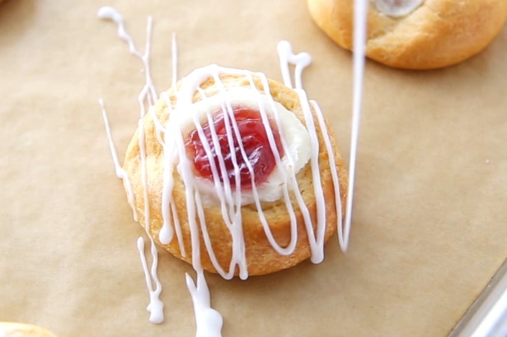Easy Cherry Cheese Danish - Frosting drizzling over top of danish
