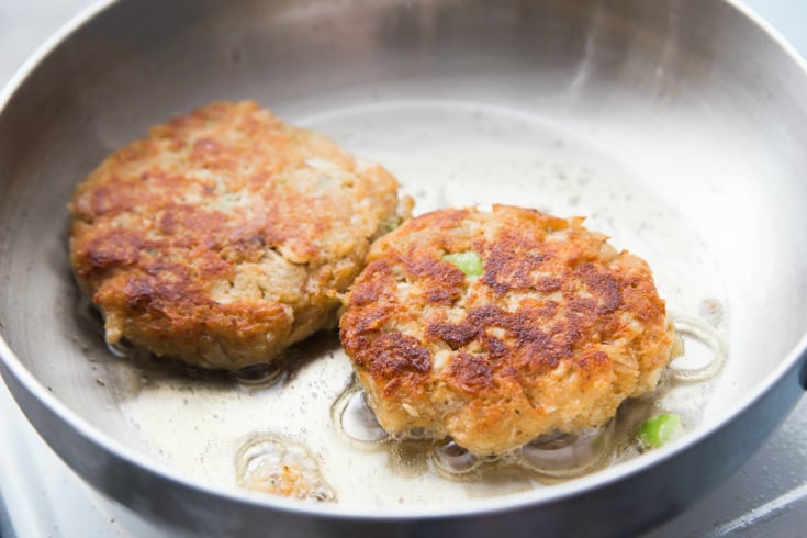 Easy Tuna Patties - tuna patties cooking in a frying pan