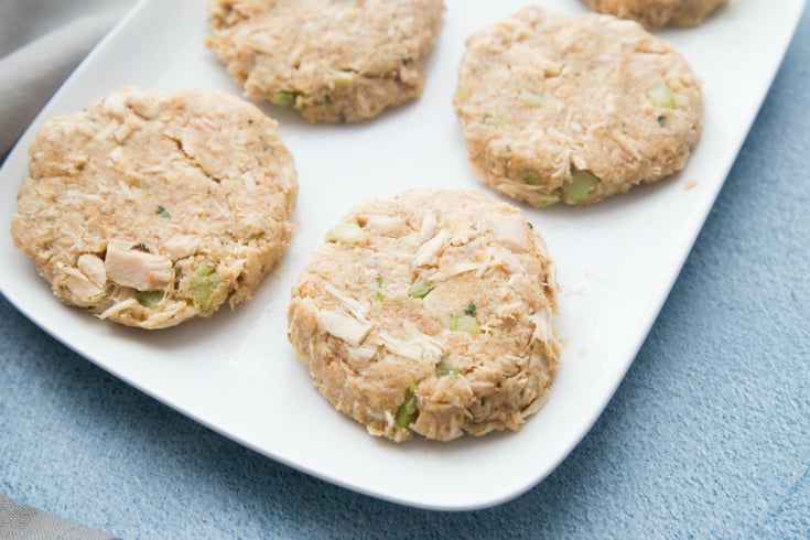 Easy Tuna Patties - tuna patties formed and sitting on a white plate