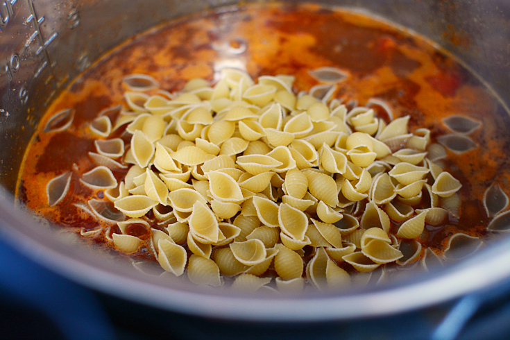 Instant Pot Taco Pasta - uncooked noodles placed in Instant Pot