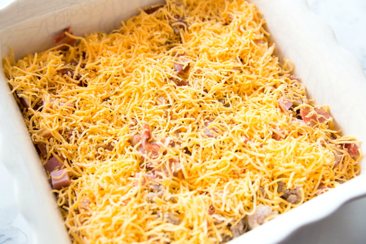 Meat Lovers Baked Omelet - Shredded cheese on casserole