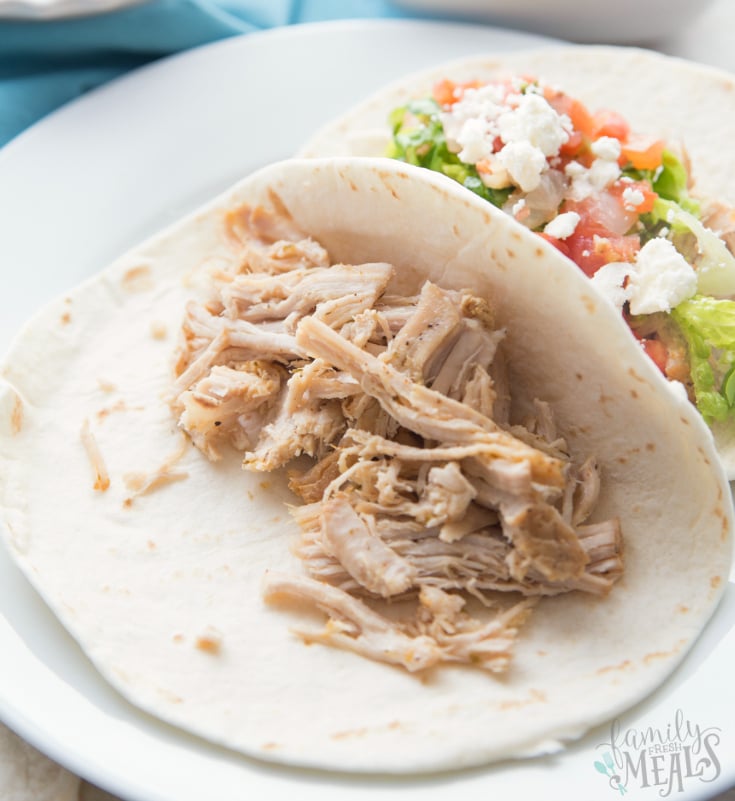 Crockpot Citrus Pork Street Tacos - Shredded pork in a flour tortilla