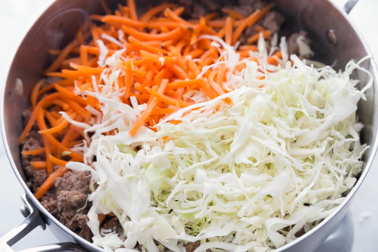 Healthy Egg Roll Stir Fry - Cabbage carrots and beef in a pan