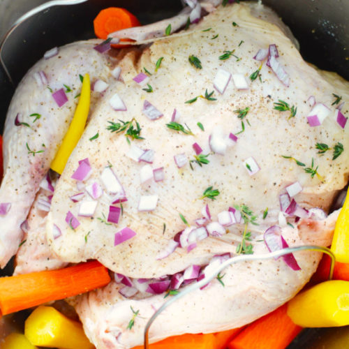 How to Make an Instant Pot Whole Chicken - Whole chicken, carrots and seasoning in the Instant Pot - Family Fresh Meals