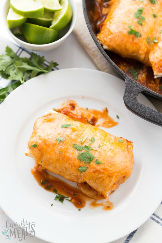 One Pan Smothered Beef Burrito Skillet - Burrito served on a white plate. Family Fresh Meals