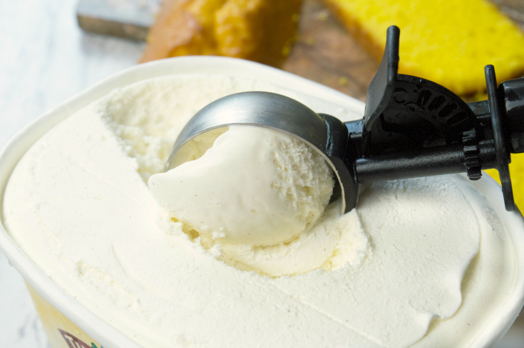 Easy Lemon Ice Cream Cake - Ice Cream scoop scooping vanilla ice cream
