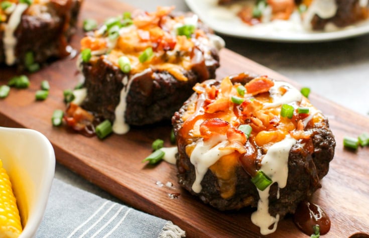 Fully Loaded Burger Bowls - Keto Recipe - Cooked burger bowls topped with cheese, bacon, ranch, bbq sauce and chives