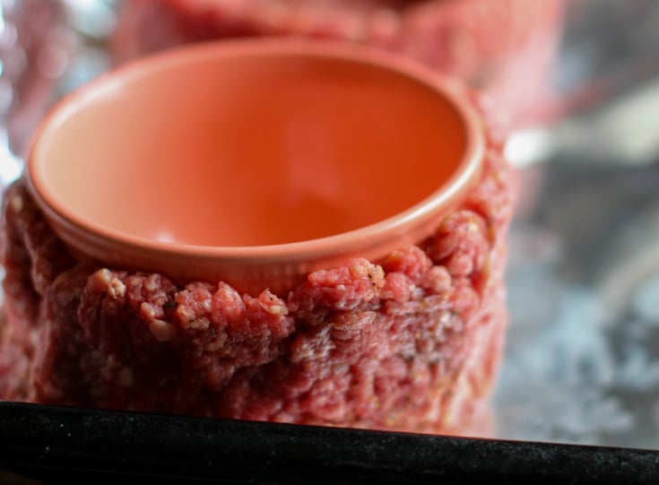 Fully Loaded Burger Bowls - bowl pushed into center of ground beef, forming a bowl