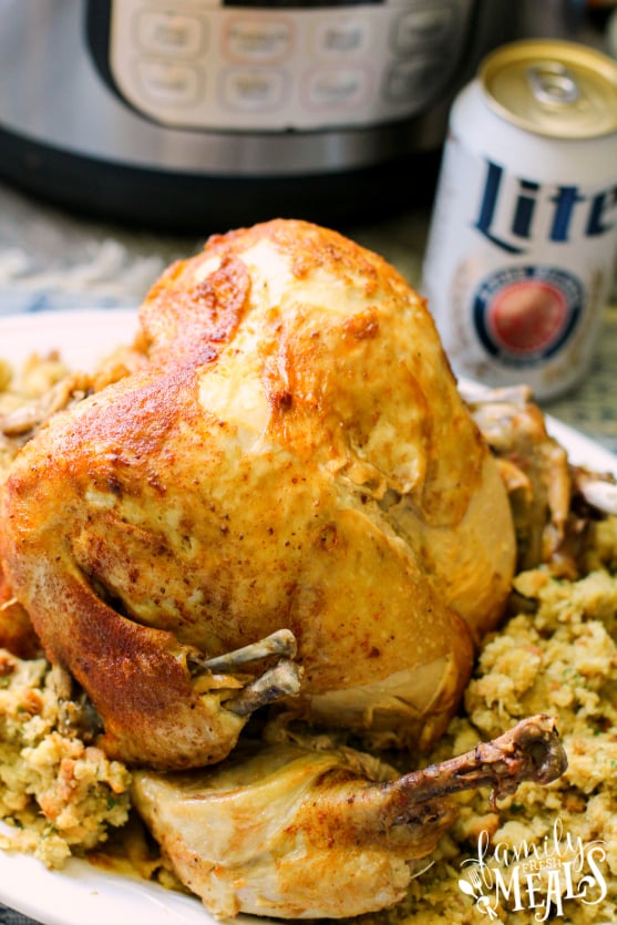 Instant Pot Beer Can Chicken - Beer Can Chicken served on a plate with stuffing