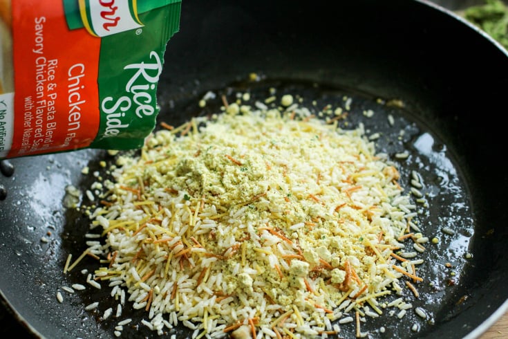 One Pot Italian Chicken Rice - adding rice mix to a pan