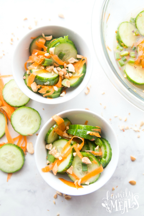 Thai Cucumber Salad - Cucumber salad in 2 small white bowls