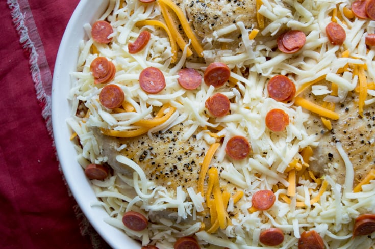 Pizza Chicken Bake - Chicken topped with shredded cheese and mini pepperoni