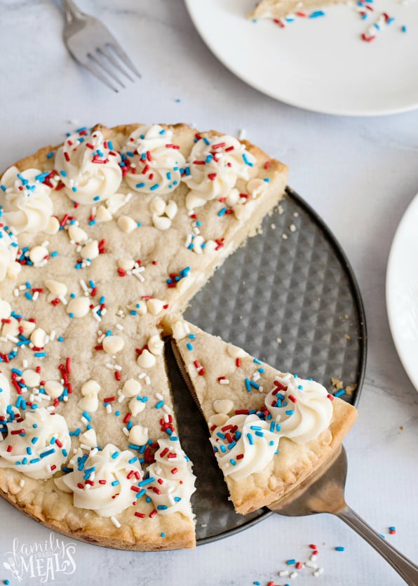 Sugar Cookie Cake - Cutting a slice out of the sugar cookie cake