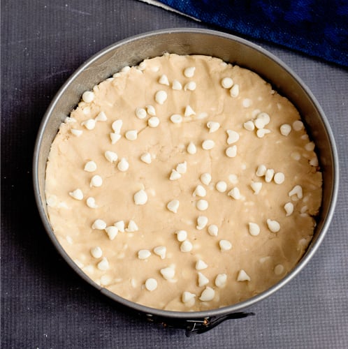 Sugar Cookie Cake - push dough into a spring form pan and top with more chips