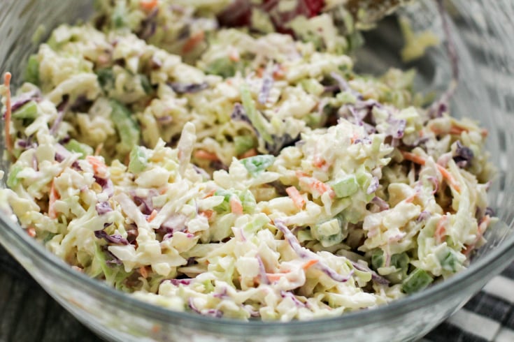Classic Creamy Cole Slaw - cole slaw ingredients in a glass bowl, mixed together - family fresh meals