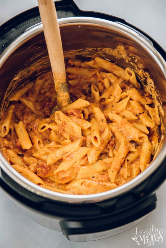 Instant Pot Three Cheese Ziti - Pasta stirred in an instant pot