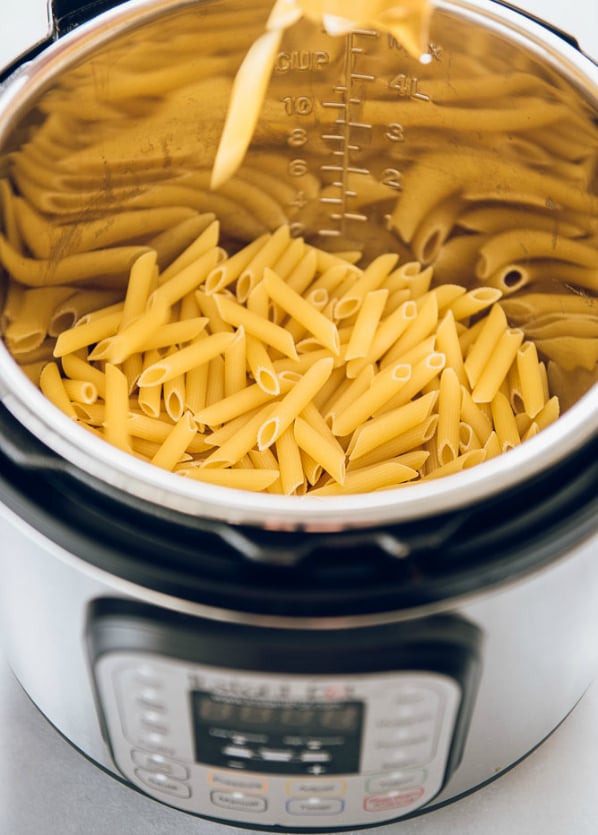 Instant Pot Three Cheese Ziti - Uncooked noodles inside instant pot pressure cooker