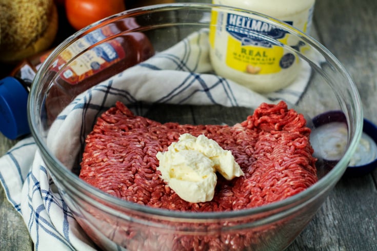 The Best Burgers Recipe - mayo and ground beef in a glass bowl - Family Fresh Meals