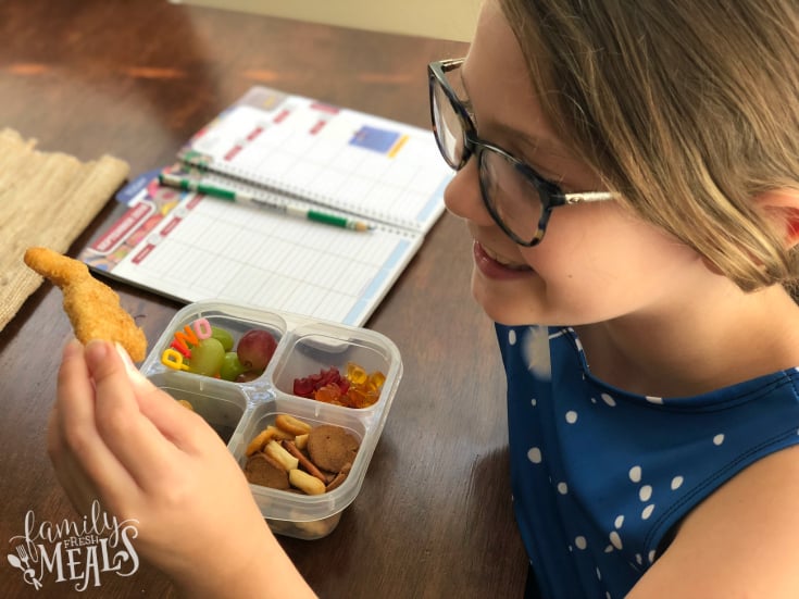 Yummy Dino Buddies - Enjoying dino chicken nuggets for lunch- Family Fresh Meals