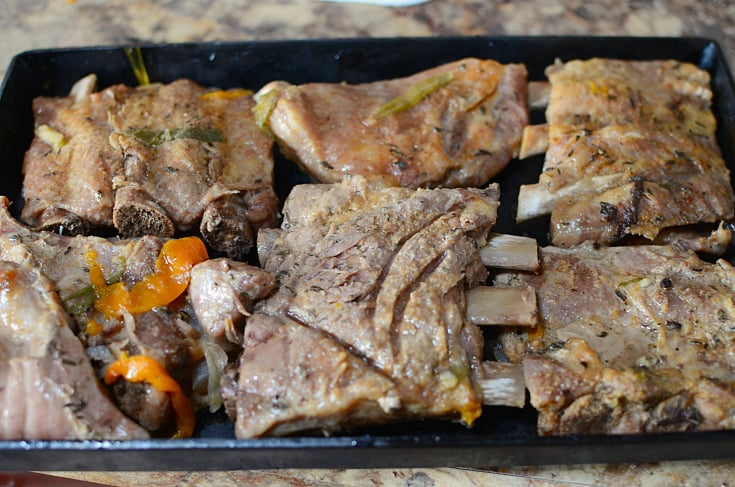 Instant Pot Baby Back Ribs - Cooked. ribs on baking sheet
