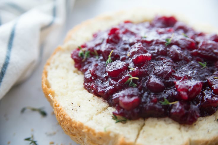 Pull Apart Cranberry Brie Bread Bowl - brie topped with cranberry sauce and seasoning - Family Fresh Meals