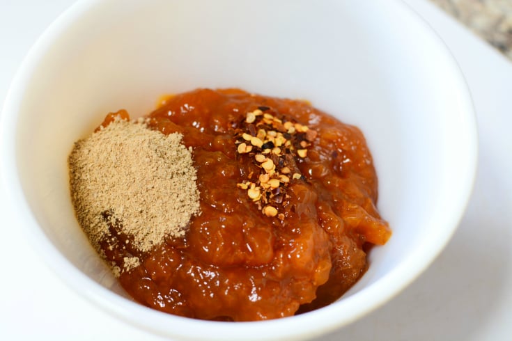 Baked Apricot Chicken - Sauce and seasoning in a small white bowl